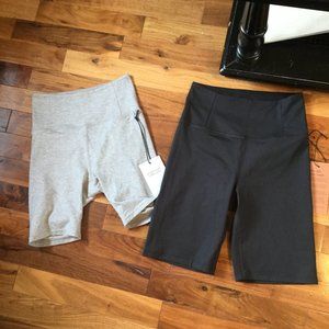 NWT 2 pairs of Girlfriend Collective bike shorts size XS one black one gray